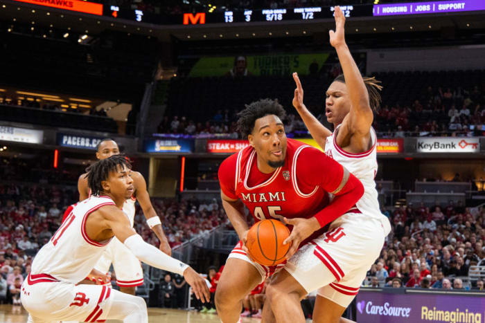Nov 20, 2022; Indianapolis, Indiana, USA; Miami (Oh) Redhawks forward Anderson Mirambeaux (45) shoots the ball while Indiana Hoosiers forward Malik Reneau (5) defends in the first half at Gainbridge Fieldhouse. Mandatory Credit: Trevor Ruszkowski-USA TODAY Sports